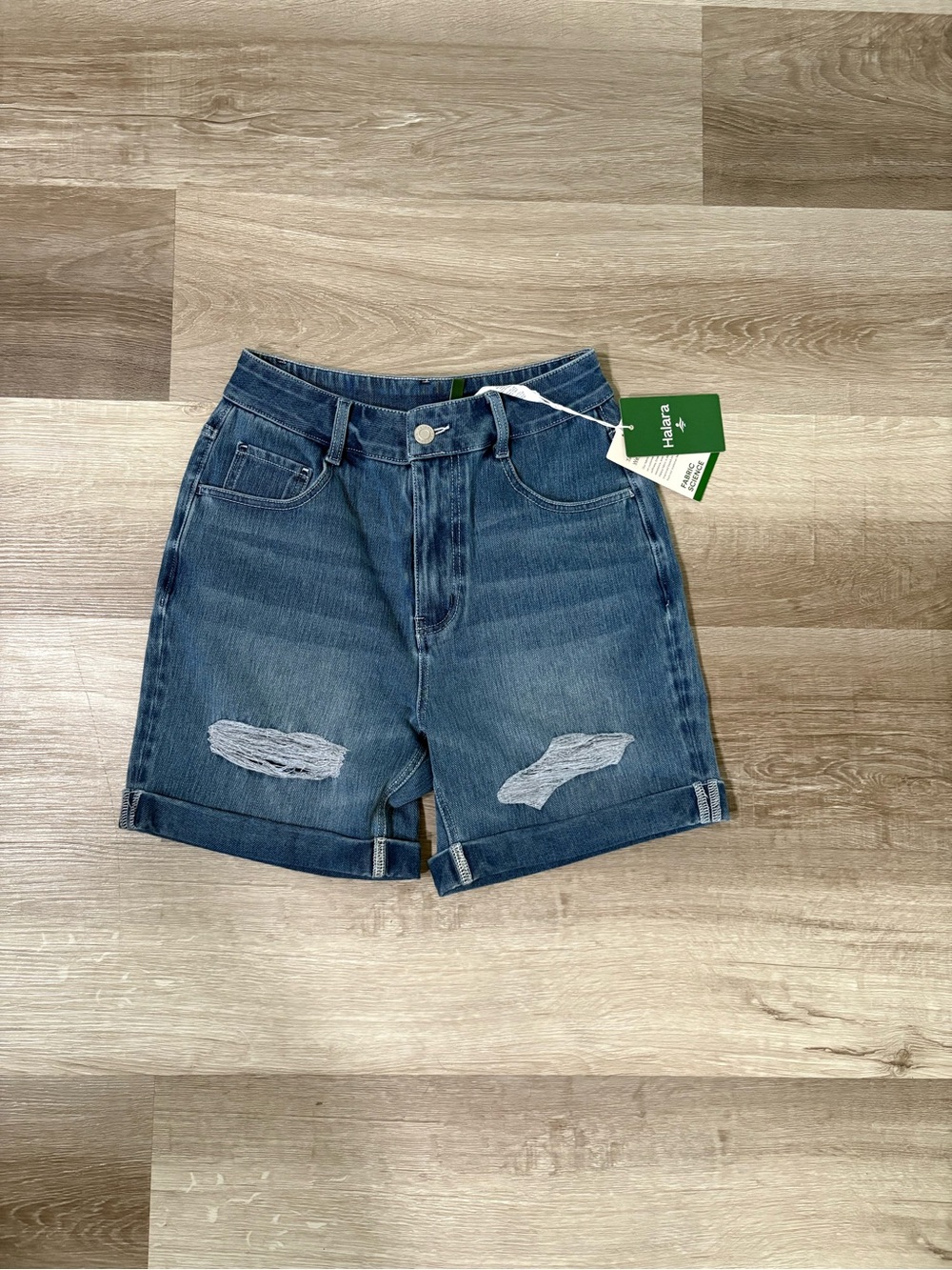 HALARA Green Logo Tag on Light Blue Denim